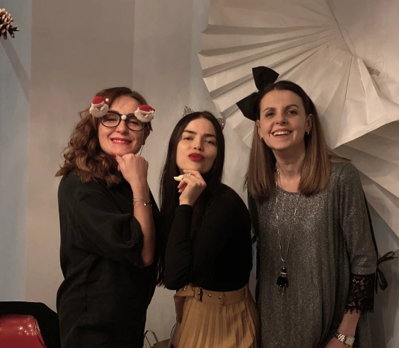 JetOctopus team members at a festive photo booth