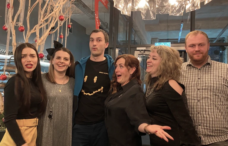 JetOctopus team celebrating together at a restaurant